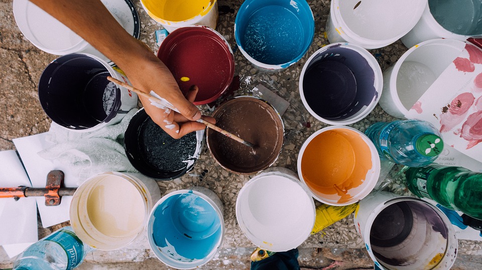 various colored paint buckets